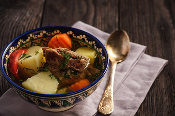 Soup with lamb and vegetables, oriental uzbek style cuisine.