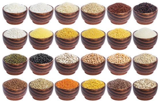 Cereals set isolated on white background. Collection of different groats, rice, beans and lentils in wooden bowls