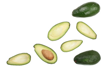 whole and half avocado isolated on white background close-up with copy space for your text. Top view