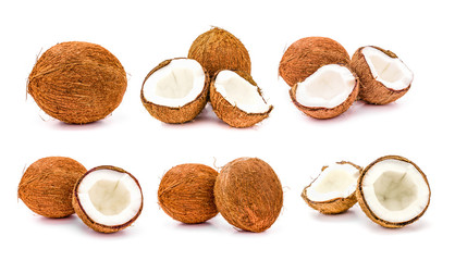 Set of whole and broken coconuts fruit isolated on white background. close up Collection of coco