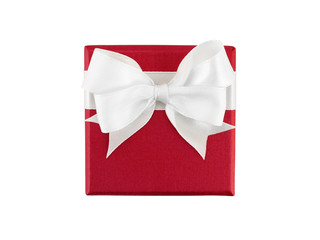 red gift box with white ribbon bow isolated on white, flat lay top view