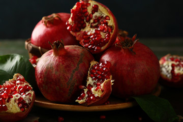 Sweet pomegranates on plate
