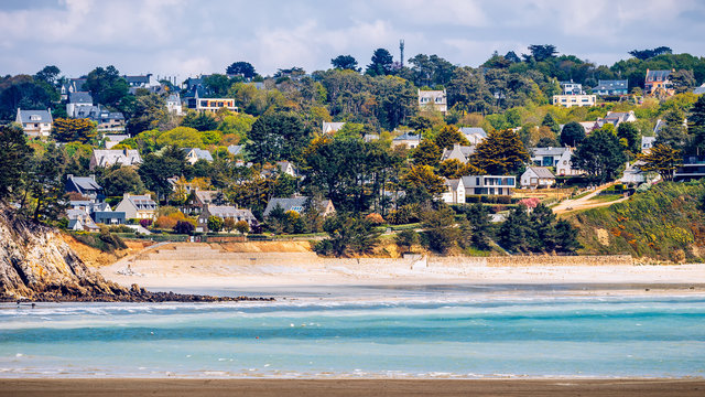 Beautiful village of Morgat with the sand beach and rocky coastline, Finistere, Brittany (Bretagne), France.