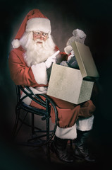 Kind Santa Teaching the Christmas Toy.