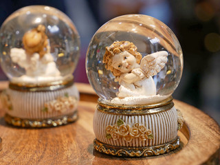 Decorative angel in a glass bulb