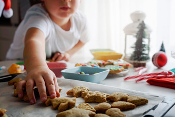 Obraz na płótnie Canvas child reaching for cookie