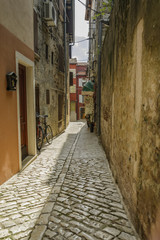 Fototapeta na wymiar a old street in the town ot Rovinj