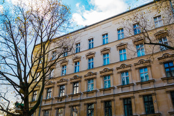 Fototapeta na wymiar brown building in berlin with grudge facade