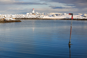 Small lighthouse-end of breakwater at Hovsundhamm fishing port. Hovsund-Gimsoya-Lofoten-Norway. 0595
