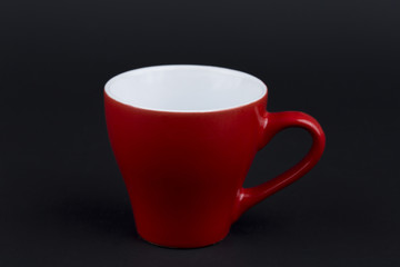 Red cup on dark insulation