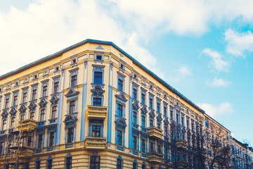 Fototapeta premium beautiful yellow and blue facaded residential building at berlin, germany