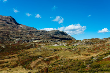 Simplon pass, alpine landscape of a mountain pass with church and lodging