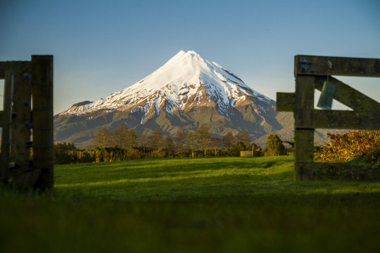 taranaki or mount egmont vulcano covered with snow during winter in new zealand near new plymouth