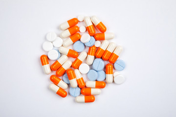 Medications and pills on a white background closeup shot