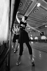 group of cute young professional ballet dancers in ballet class