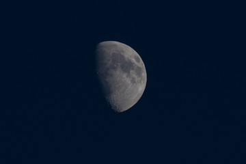 Close up of Gibbous Moon with details of craters and moon's surface