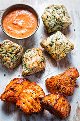 Tikka and coriander & mint marinated chicken pieces with curry dip