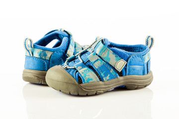 blue shoes for kid on white background