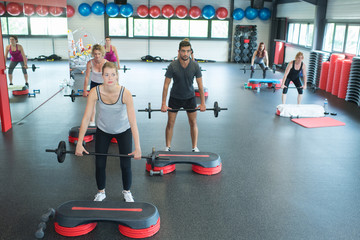 people working out at the fitness club