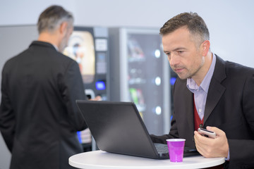 consulting laptop at a rest stop