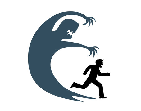 The silhouette of a man runs away from his huge shadow which symbolizes fear