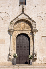 Fototapeta na wymiar Decorated entrance to the Basilica of Saint Nicholas in Bari
