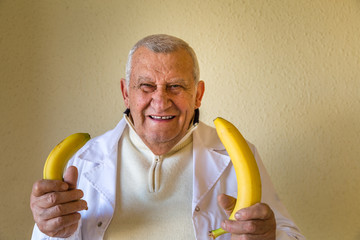 doctor comparing bananas as concept