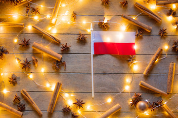 Poland flag and Christmas lights around