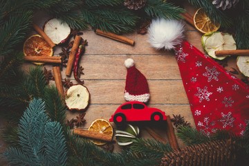 Red Christmas toy car with decoration around