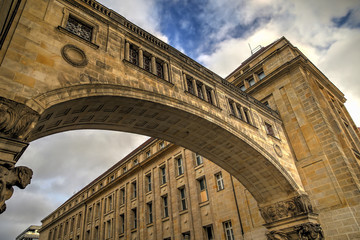 Archway Between Classical Buildings