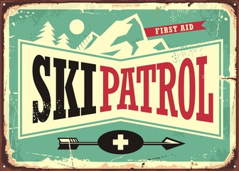 Ski patrol retro sign design with mountain shape and ski patrol text © lukeruk