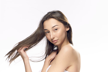 Obraz premium Young woman on white isolated background, natural beauty, portrait
