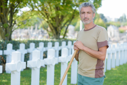 man in cemetary
