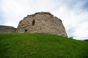 Ancient limestone fortress on a hill above the sky