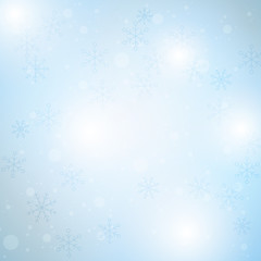 Winter blue sky with falling snow