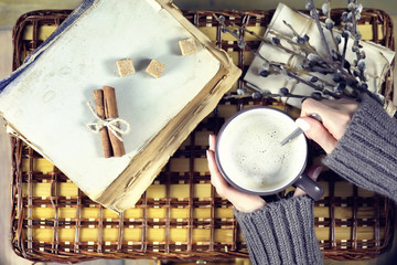 woman drinking coffee and looking at the card Valentine's Day