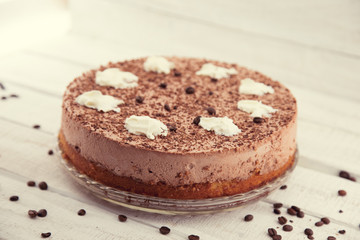 Chocolate cake on rustic wooden table, selective focus