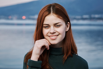 Portrait, young beautiful woman outdoors, sea, nature