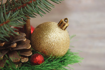 Golden fir tree toy ball. Cristmas Decoration. New Year Background