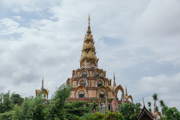 White big buddha aerial view with mountain background at Wat Prathat Phasornkaew, Khao Kho, Phetchabun, Thailand