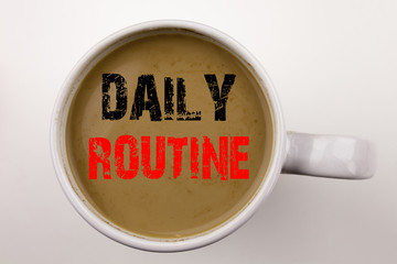 Word, writing Daily Routine text in coffee in cup. Business concept for Accuracy Procedure on white background with copy space. Black text with red word.