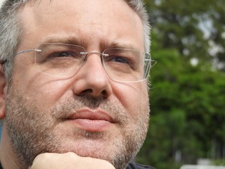 Unshaven Male Wondering