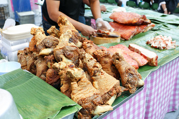 Roasted pork knuckle with crispy skin for sell at Petchburi Road, Bangkok, Thailand