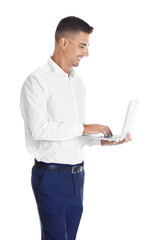 Young man with laptop on white background