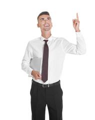 Young man with laptop on white background