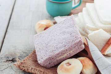 Cream bread on wooden.