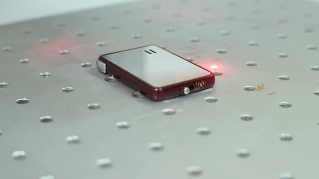 Demonstration of laser engraving on the lighter. Laser engraving on metal.