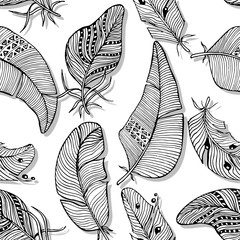 Vector seamless pattern. The monochrome background of various hand drawn feathers on white background.