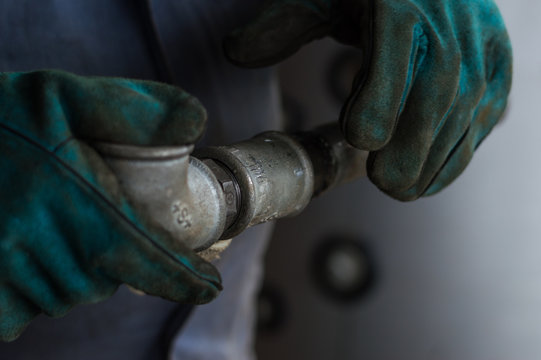 Metal pipes in hands