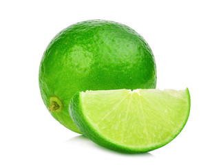 whole and slices fresh green lime isolated on white background